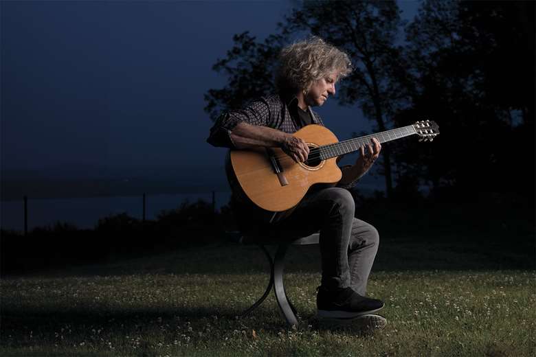 Pat Metheny with his baritone guitar (photo by Jimmy Katz) 